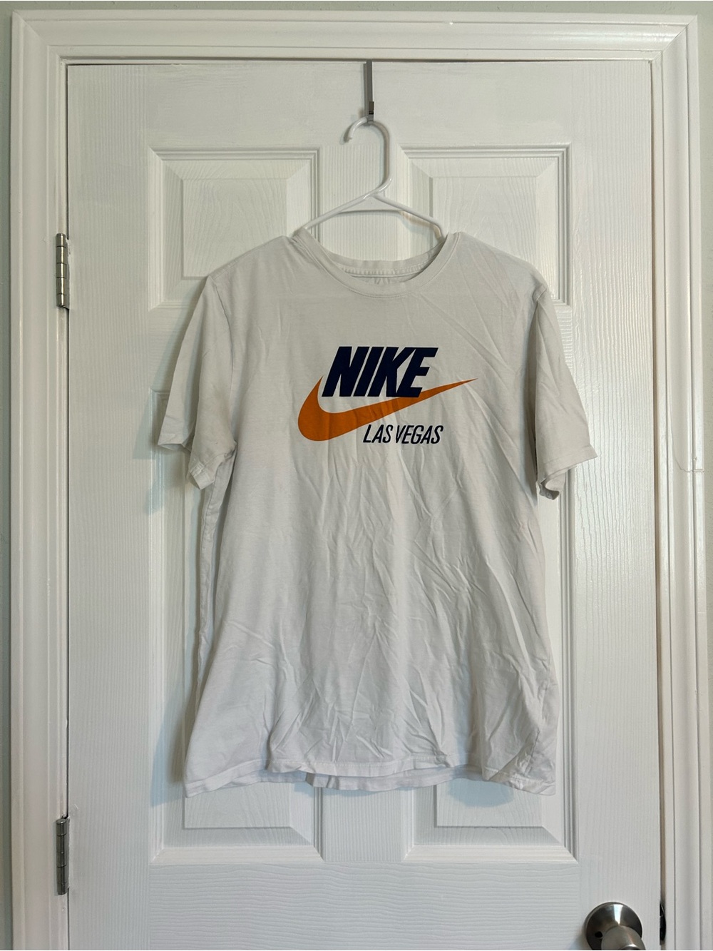 Nike White Las Vegas Graphic Tee with Navy and Orange Logo